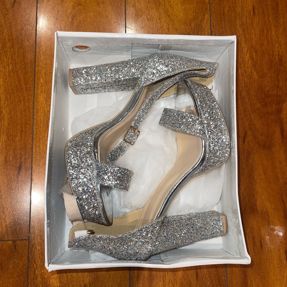 Silver Glitter Block Heels
Worn out once-sitting in closet since
Priced to go!
